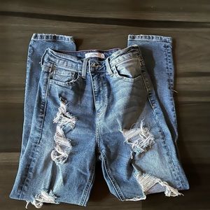 light blue high waisted ripped jeans.